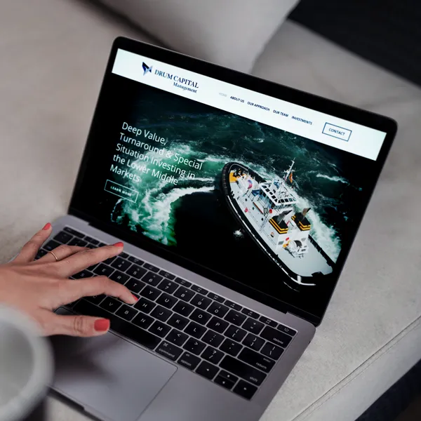 Drum Capital brand identity — wordmark on a textured background